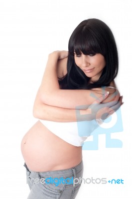 Pregant Woman With Folded Arms Stock Photo