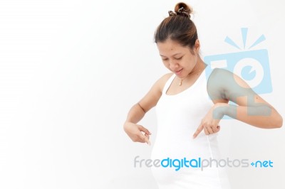Pregnant Woman Touching Her Belly Stock Photo