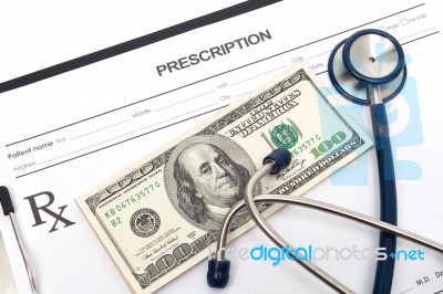 Prescription With Money And Stethoscope Stock Photo