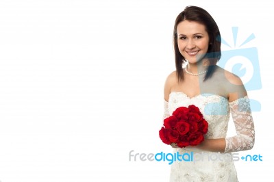 Pretty Bride Posing With Love Red Roses Bouquet Stock Photo