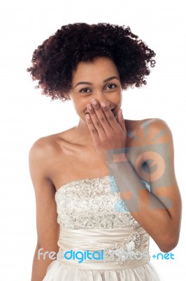 Pretty Model In Party Wear Stifling Her Giggle Stock Photo