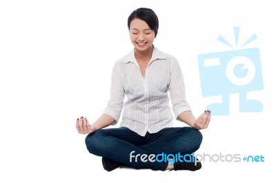 Pretty Woman Doing Meditation Stock Photo