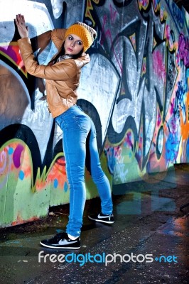 Pretty Young Girl And Graffiti Stock Photo
