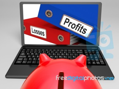 Profits And Looses Files On Laptop Shows Expenses Stock Image