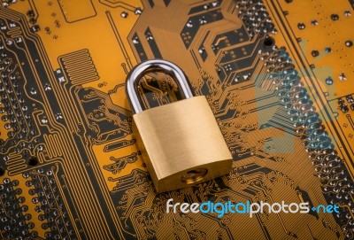 Protection Concept : Security Lock On Computer Circuit Board Stock Photo