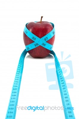 Red Apple With Tape Stock Photo
