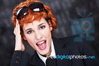 Red Hair Woman With Big Sun Glasses Stock Photo