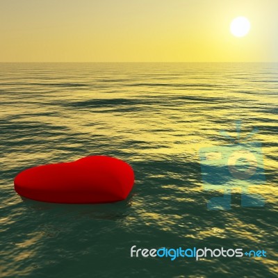 Red Heart Floating On Sea Stock Image