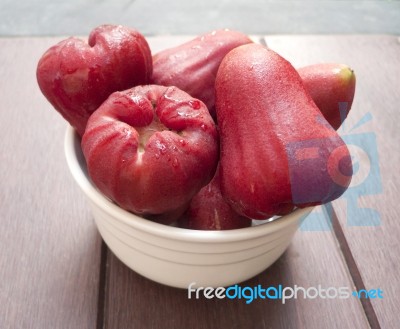 Red Rose Apple In A Cup Stock Photo