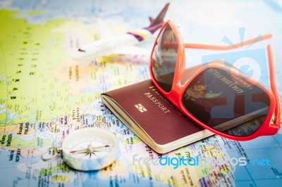 Red Sunglasses, Passport, Compass And Aircraft On Europe Map Stock Photo