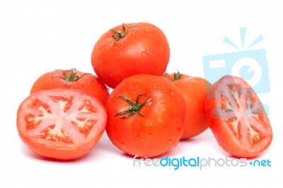 Red Tomatoes With Water Droplets Stock Photo