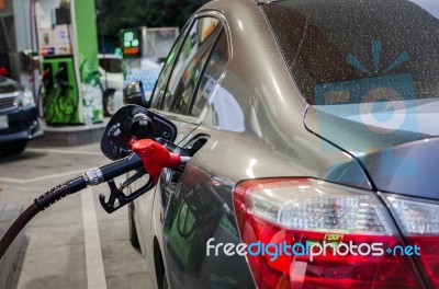 Refilling The Car With Fuel On A Filling Station Stock Photo