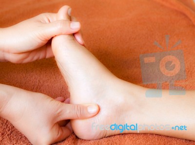 Reflexology Foot Massaging Stock Photo