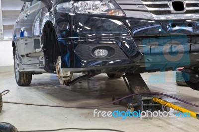 Repairing Car In Garage  Stock Photo