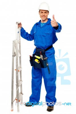 Repairman Showing Thumb Up Stock Photo