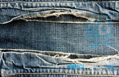 Ripped Vintage Jeans Stock Photo