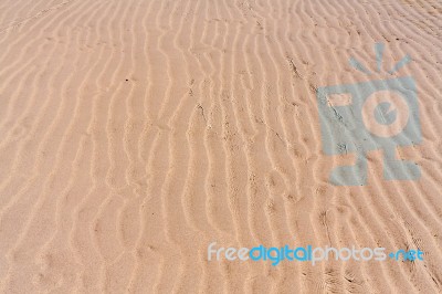 Ripple Water On The Beach Stock Photo