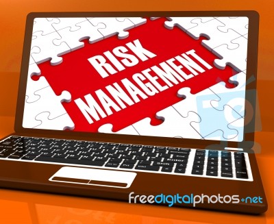 Risk Management On Laptop Showing Risky Analysis Stock Image