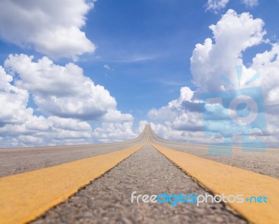 Road Asphalt To The Sky Over The Clouds Stock Photo