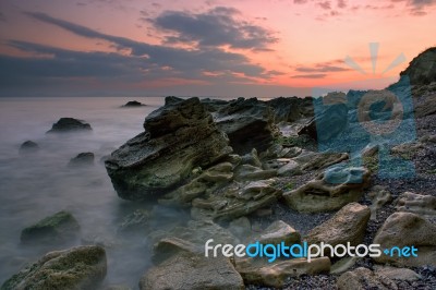 Rocks And The Sunset Stock Photo