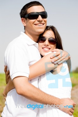 Romantic Couple Hugging Stock Photo