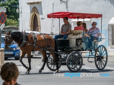 Ronda, Andalucia/spain - May 8 : Tourists Enjoying A Ride In A H… Stock Photo