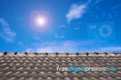 Roof And Blue Sky Stock Photo