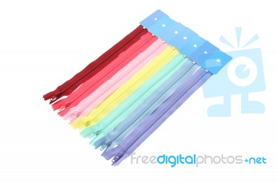 Row Of Multiple Color Zipper On White Background Stock Photo