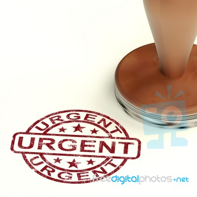 Rubber Stamp With Urgent Word Stock Image