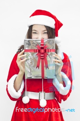 Santa Claus Hat With Grey Christmas Gift Box Stock Photo