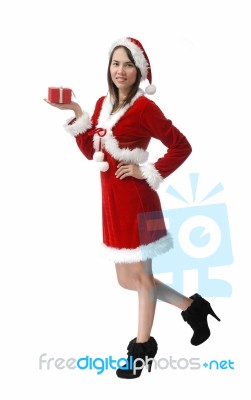 Santa Girl Holding Present Stock Photo