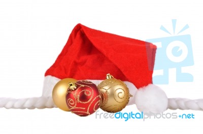 Santa Hat With Christmas Bauble Stock Photo