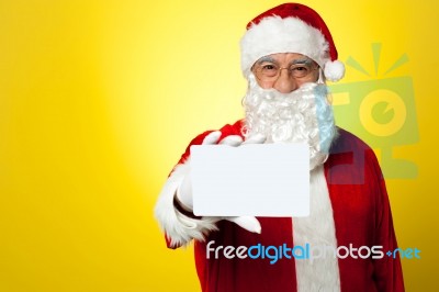 Santa Holding Blank White Placard Stock Photo