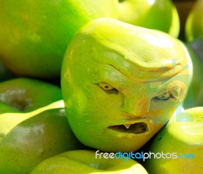 Scary Green Apple Stock Photo