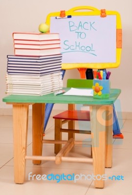 School Books On Desk With Sketchboard Stock Photo