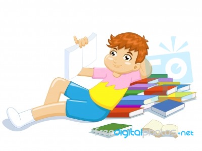 School Boy Lying And Reading Stock Image