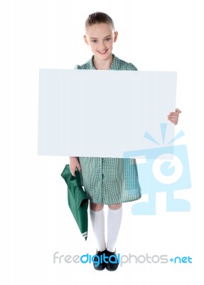 School Girl showing Blank Board Stock Photo
