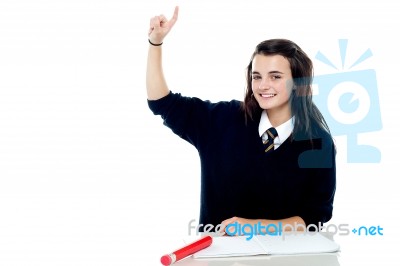 Schoolgirl Showing Pointing Upwards Stock Photo