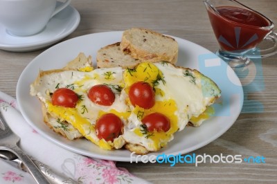 Scrambled Eggs With Tomatoes Stock Photo