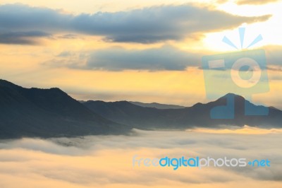 Sea Of Fog And Mountain Stock Photo