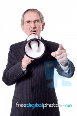 Senior Casual Male With Megaphone Stock Photo
