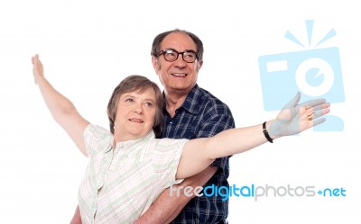 Senior Couple Hugging On White Stock Photo
