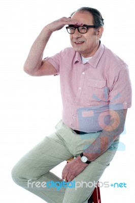 Senior Man Looking Far Away Stock Photo