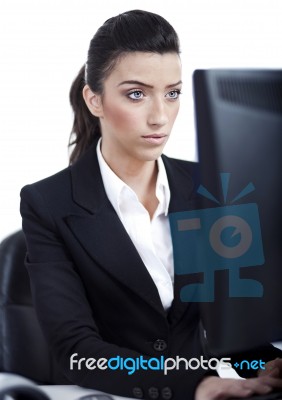 Serious Business Woman Working In Computer Stock Photo