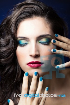 Sexy Beauty Girl With Red Lips And Blue Nails Stock Photo