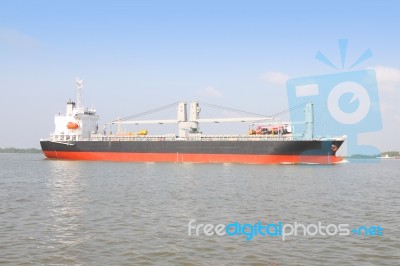 Ship For Contain Auto Mobile In Wide River Stock Photo