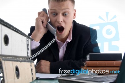 Shocked Manager Holding Receiver Stock Photo