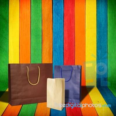 Shopping Bag On Wood Background Stock Photo