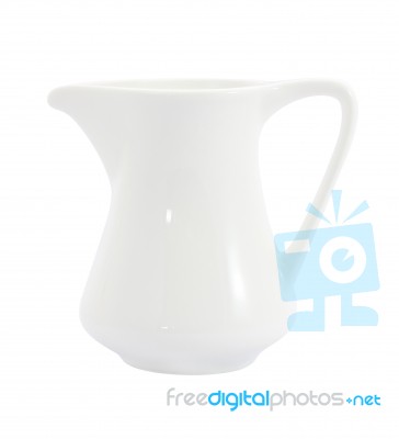 Side Of Ceramic Milk Jug On White Background Stock Photo