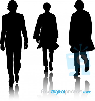 Silhouette guys walking Stock Image